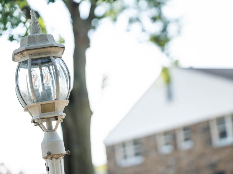 Lamp post and campus building